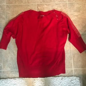 A red dressy and classy women quarter sleeve shirt
